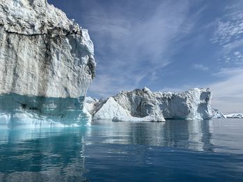 Scenic view of frozen sea against sky