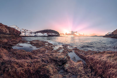 Scenic view of sea against sky during sunset