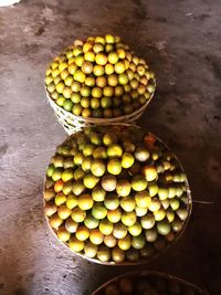 High angle view of fruits on table against wall