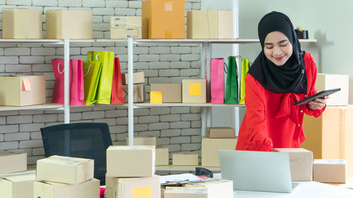 Young woman using mobile phone