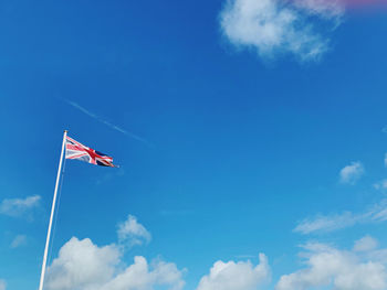 Low angle view of flag against sky