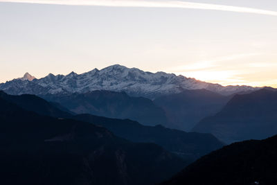 Scenic view of mountains against sky during sunset