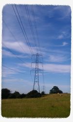 Electricity pylon on field