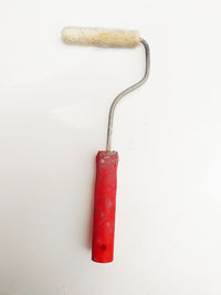 High angle view of red chili pepper against white background