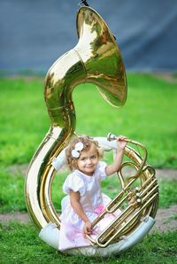 Child and musical instrument