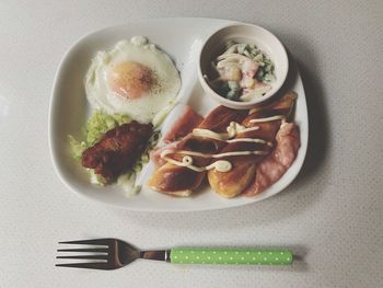 High angle view of breakfast served on table