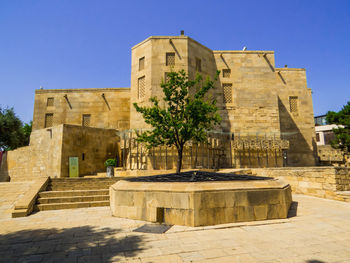 Low angle view of historical building against clear sky