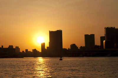 Silhouette of buildings at sunset