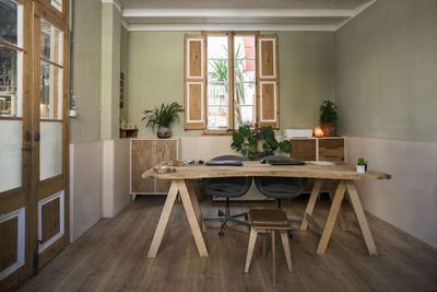 Chairs and table in office room at workshop