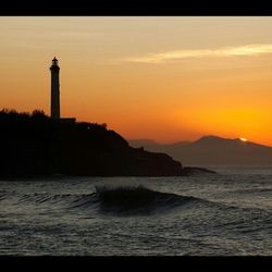 Scenic view of sea at sunset