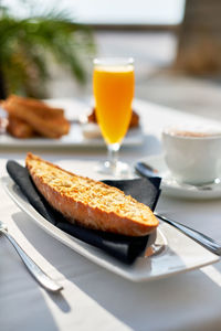 Close-up of breakfast served on table