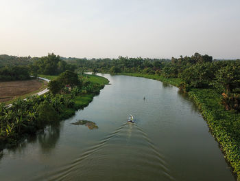 Scenic view of river against clear sky