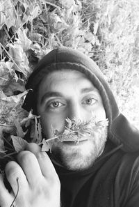 Portrait of man with plants