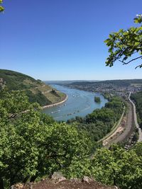 Scenic view of landscape against clear blue sky