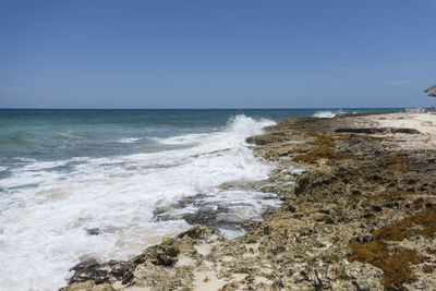Scenic view of sea against clear sky