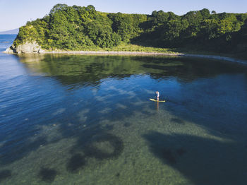 Aerial view of sup surfer, primorsky region, russia