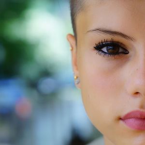 Close-up portrait of woman in make-up