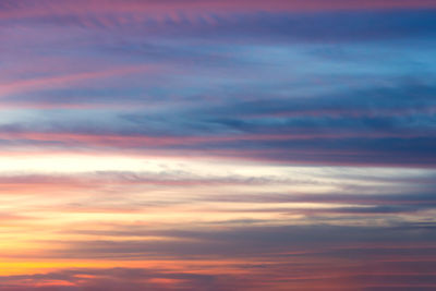 Low angle view of dramatic sky during sunset