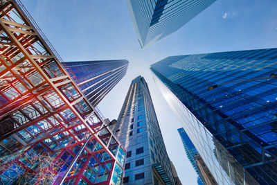 Low angle view of modern buildings in city