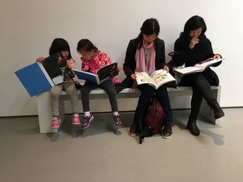 Group of people sitting on seat