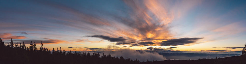 Scenic view of dramatic sky during sunset