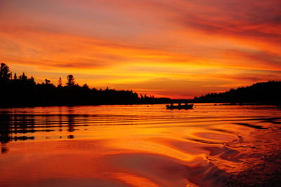 Scenic view of sea at sunset