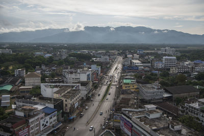 High angle view of street amidst buildings in city