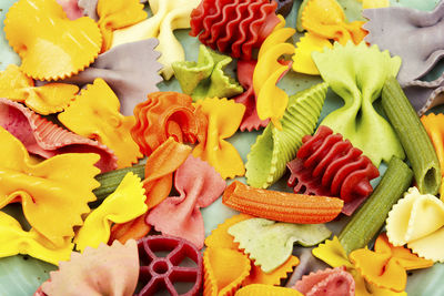 Colorful italian pasta. various colors of pasta. texture background