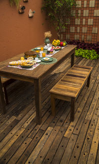 High angle view of empty chairs and table