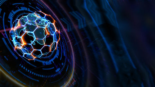 Low angle view of illuminated lights at night