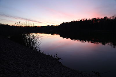 Scenic view of lake during sunset