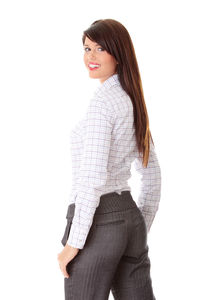 Portrait of woman standing against white background