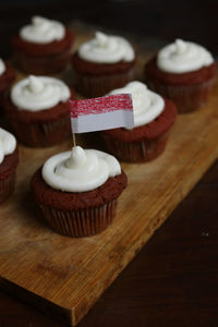 Close-up of cupcakes on table with little flag