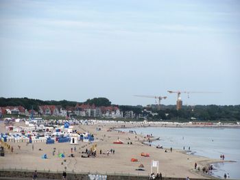 High angle view of people on beach against sky