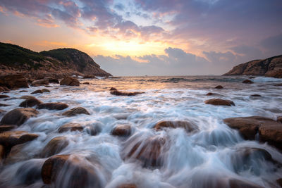 Scenic view of sea against sky during sunset