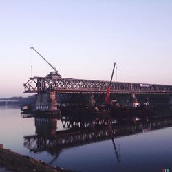 View of bridge over sea against clear sky