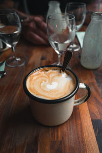 Close-up of coffee served on table