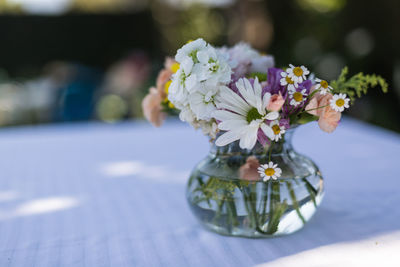 Close-up of flower vase on table