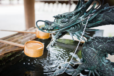 Close up of dragon fountain of water