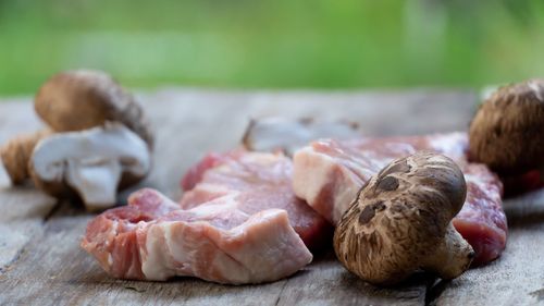 Close-up of meat on cutting board