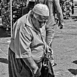 Midsection of man standing on street