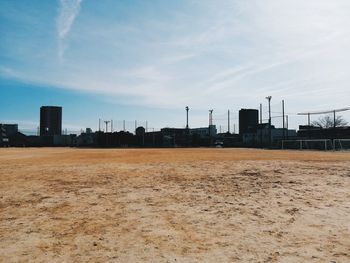 Buildings in city against sky