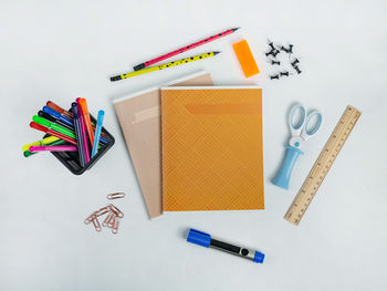 High angle view of colored pencils on table