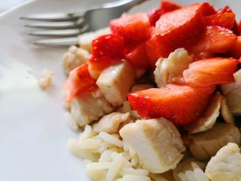 Close-up of chopped fruits in plate