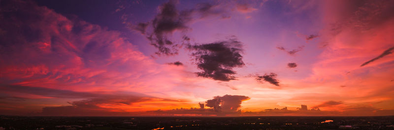 Scenic view of silhouette land against sky during sunset