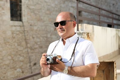 Portrait of man photographing