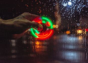 Close-up of illuminated light trails at night