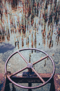 High angle view of rusty wheel