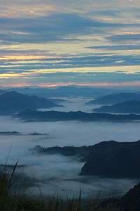 Scenic view of mountains against sky during sunset