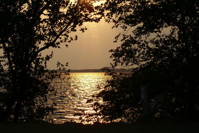 Scenic view of sea against sky at sunset